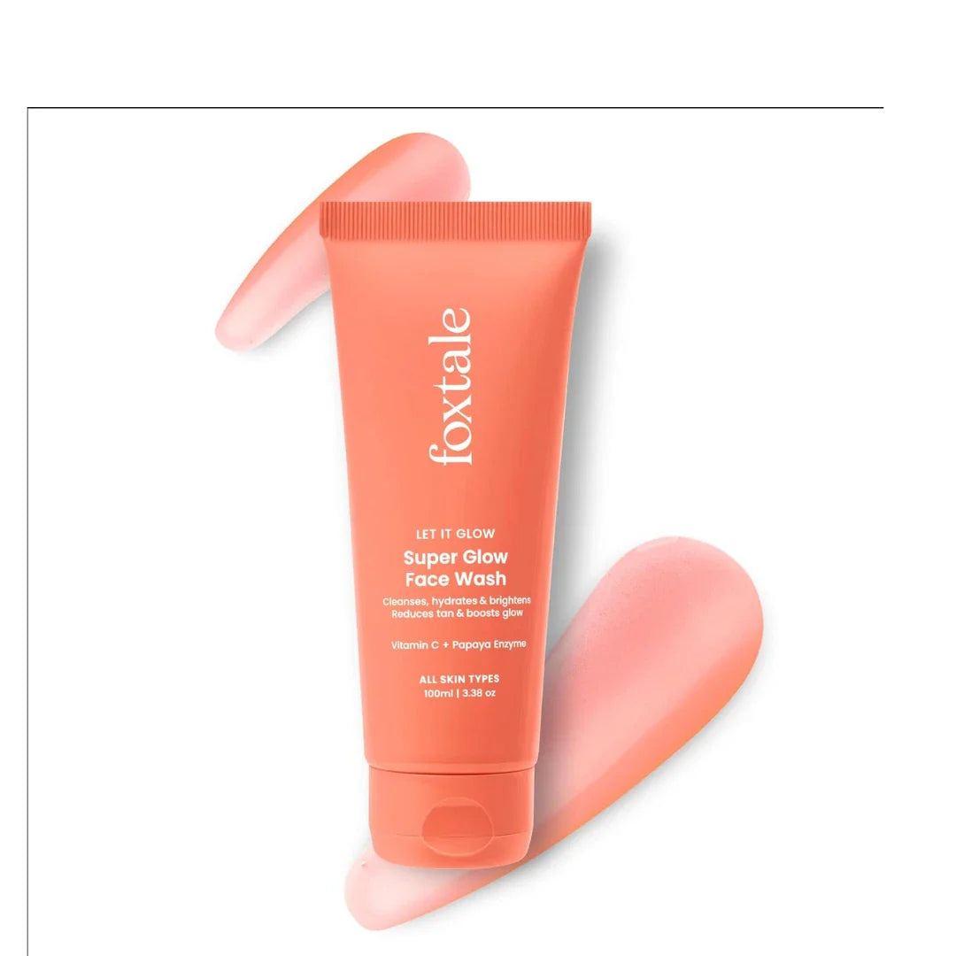 Coral-colored tube of foxtale Super Glow Face Wash on a white background